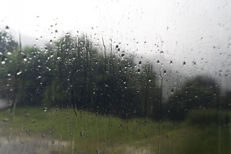 camper-window-with-rain-drops